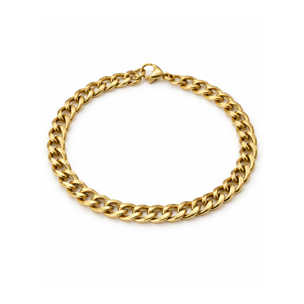 Gold tone chain bracelet on a white background