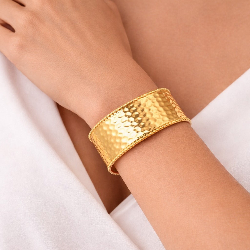 Chunky adjustable gold metal bangle for women
