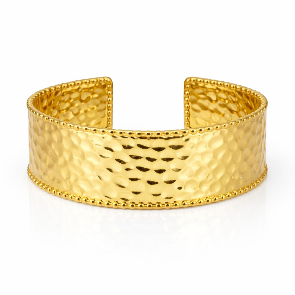 Identity gold cuff bangle with textured metal surface