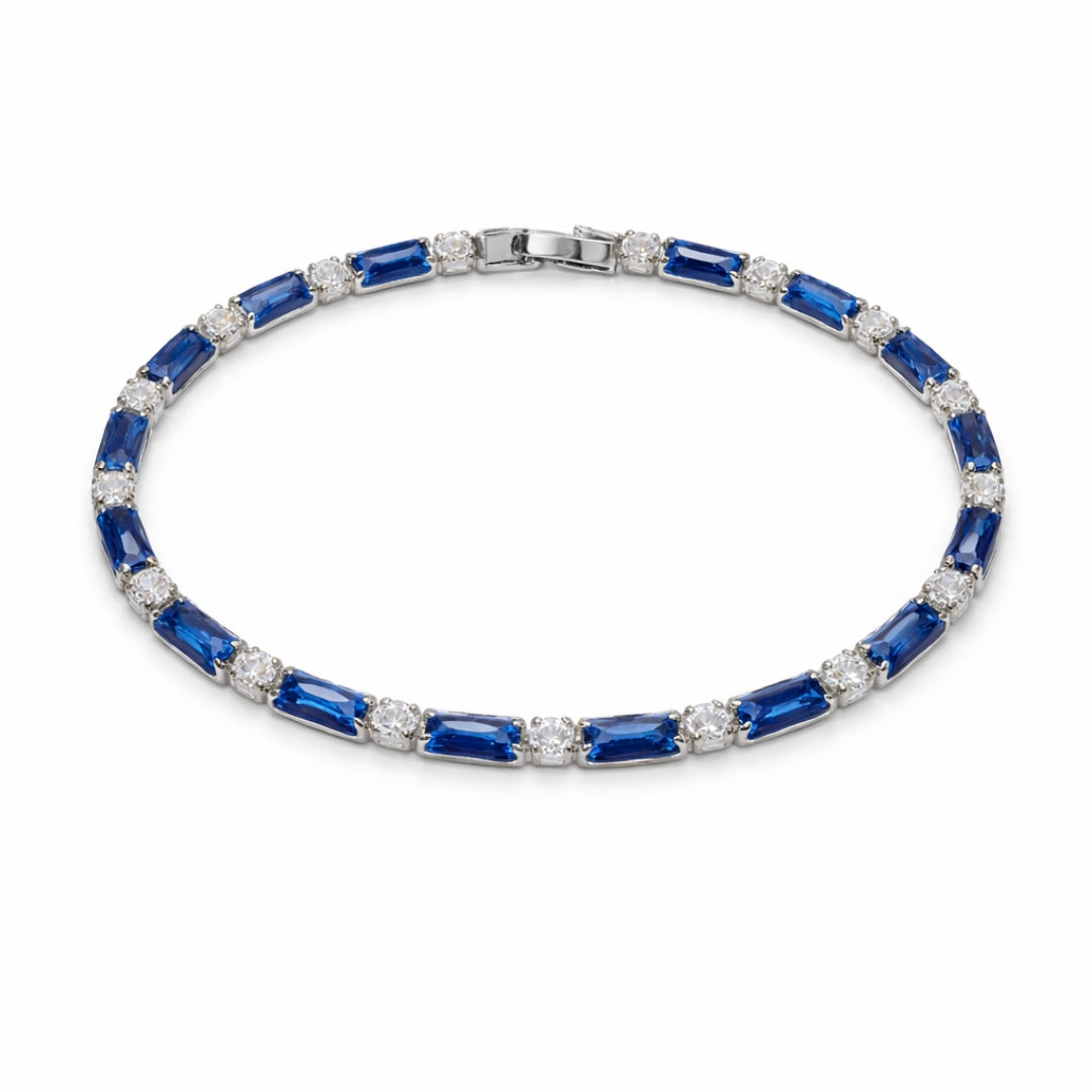 Sovereignty silver bracelet with blue and white diamond-cut stones