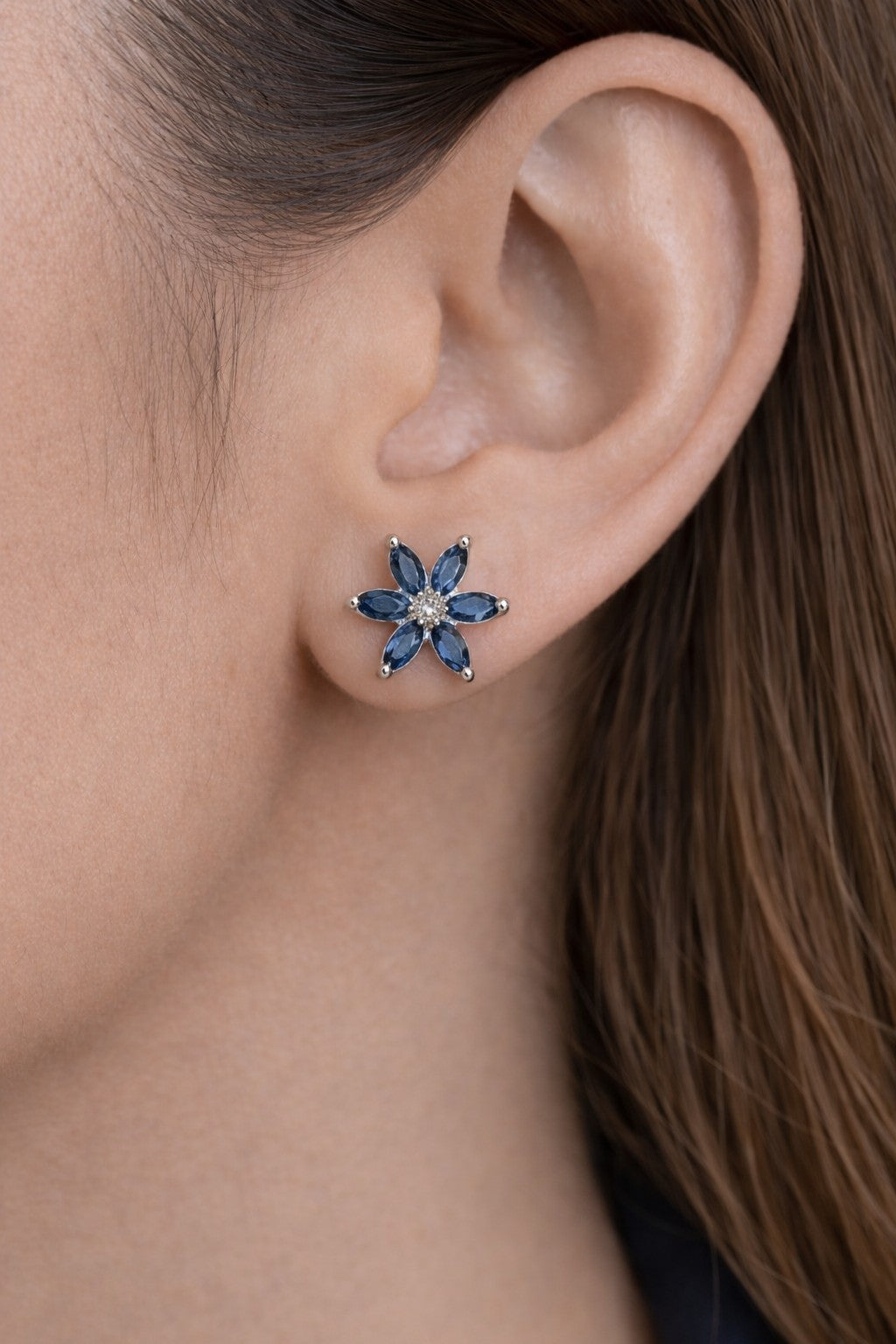 Blue fashion earrings for women from the Bloom Earrings range worn on model
