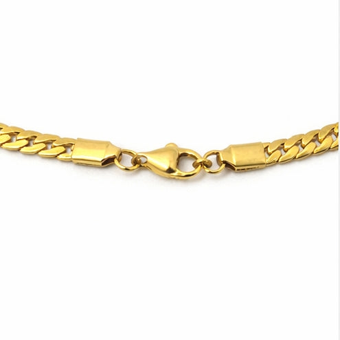 Clasp detail of necklace with polished gold-tone chain links