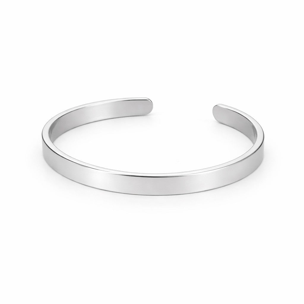 Silver bangle on a white background