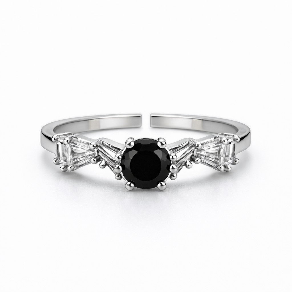 Front view of black stone ring womens style with silver-tone band