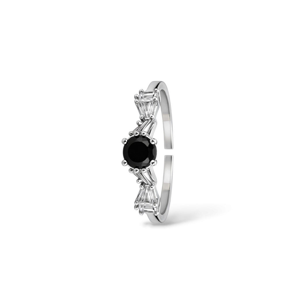 Silver ring with a black gemstone on a white background