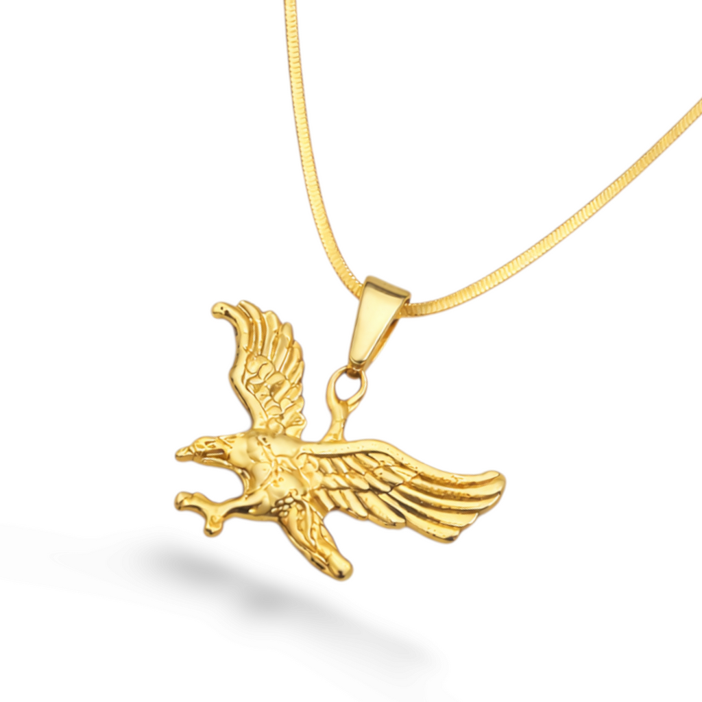 Close-up of pendant in a gold-tone eagle shape with polished finish