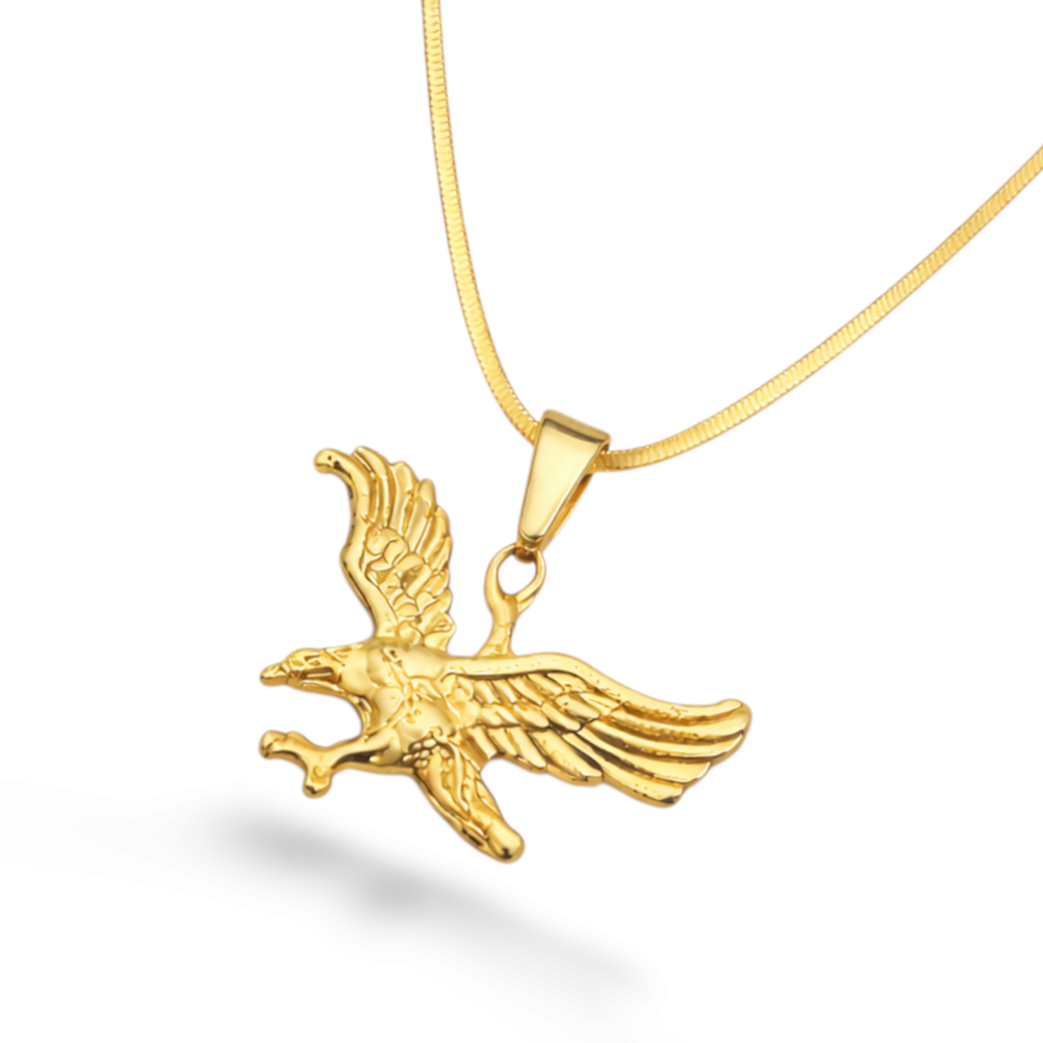 Close-up of pendant in a gold-tone eagle shape with polished finish