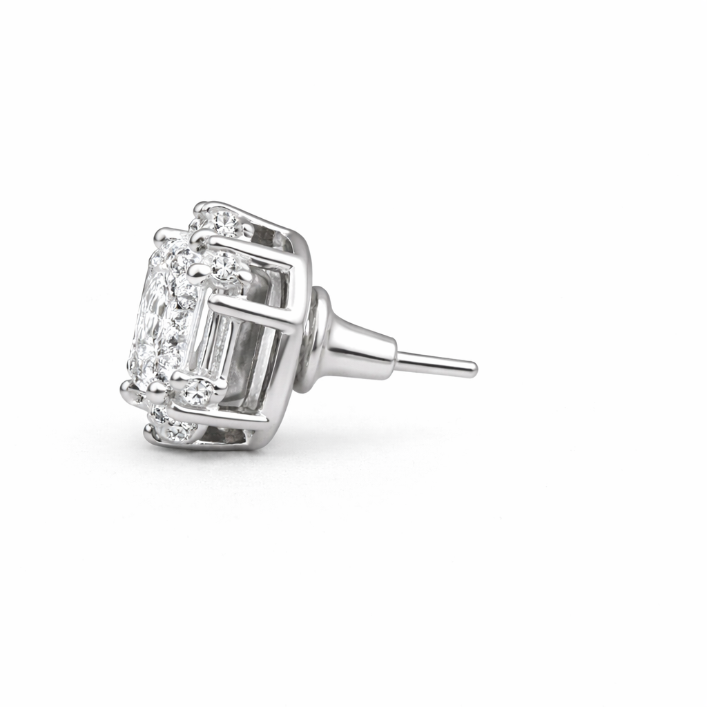 clear white earring with rectangular center stone on a white background