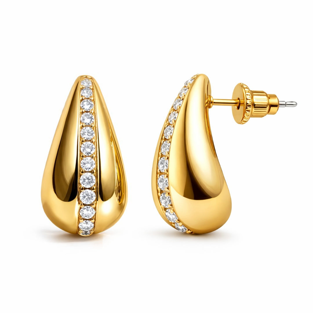 Pair of gold stud earrings for women with stone detail on white background
