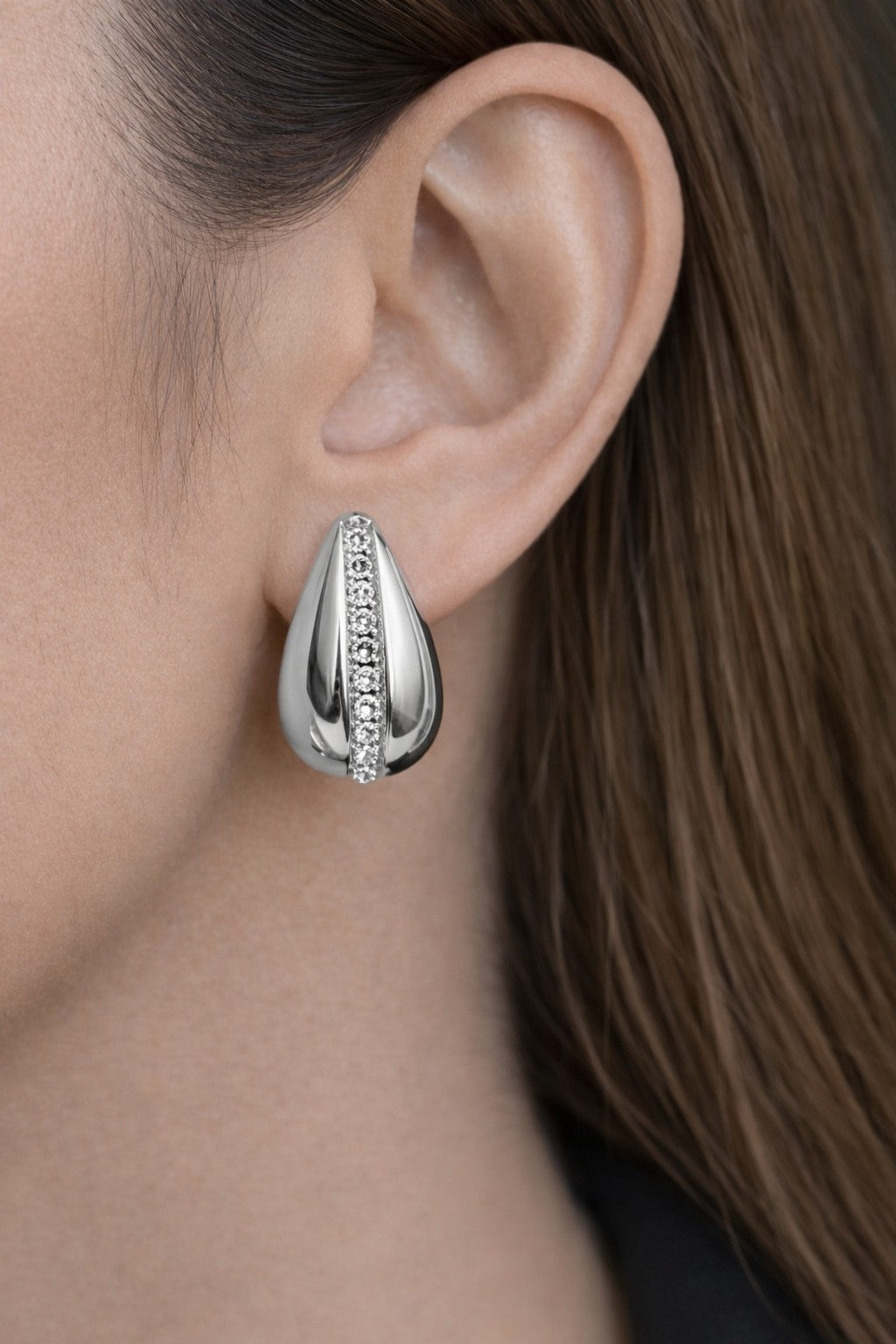 Silver small earrings for women from the Intuition Earrings range worn on model