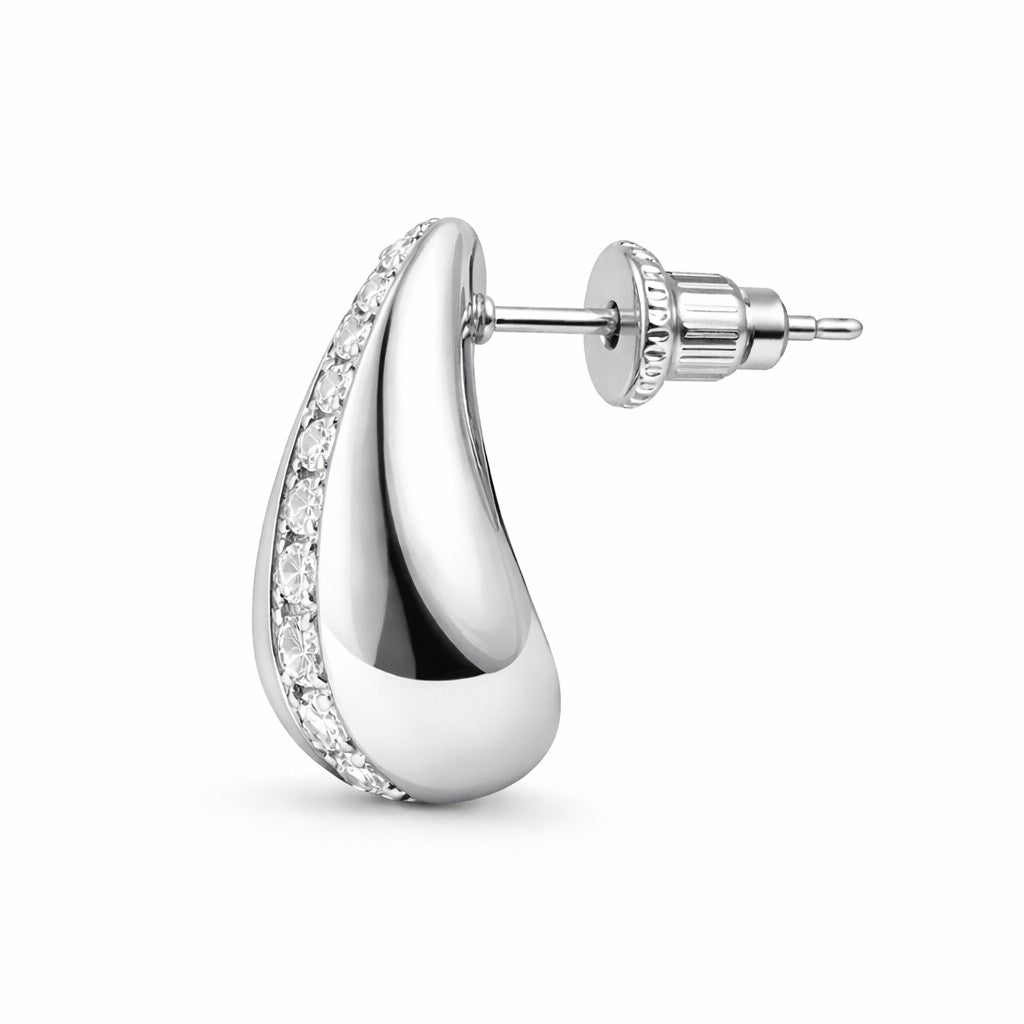 Side view of silver earrings for women with curved shape