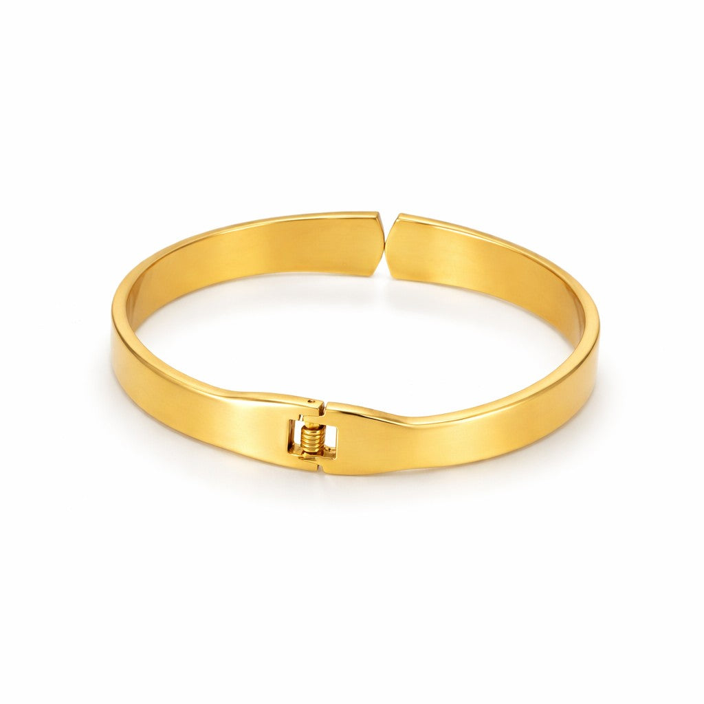 Backed view of bangle bracelet in gold tone with flush magnetic closure