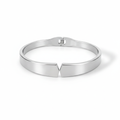 Front view of artificial bangles in silver tone with seamless magnetic closure
