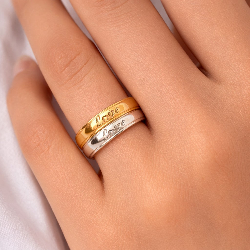 Nobel Ring Pair styled as rings for women with a gold-tone band