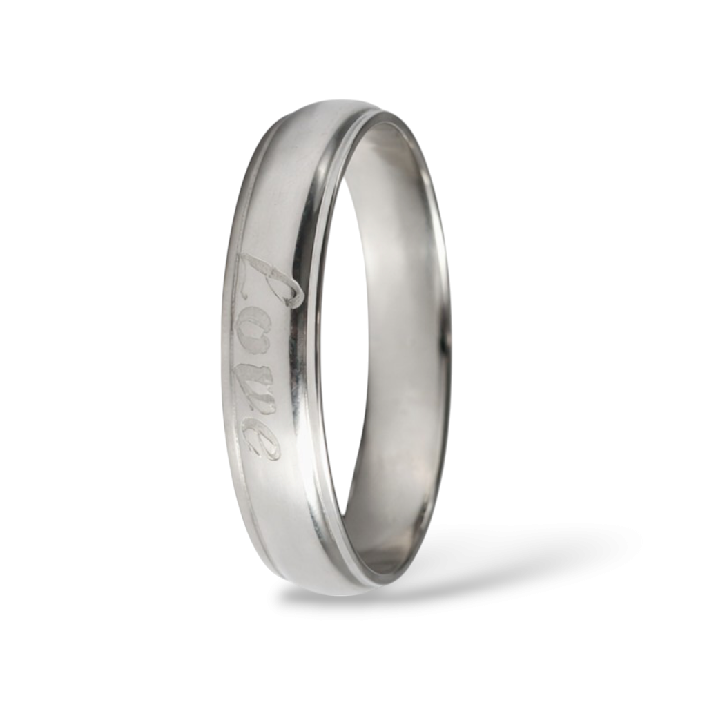 Silver ring with 'love' engraving on a white background