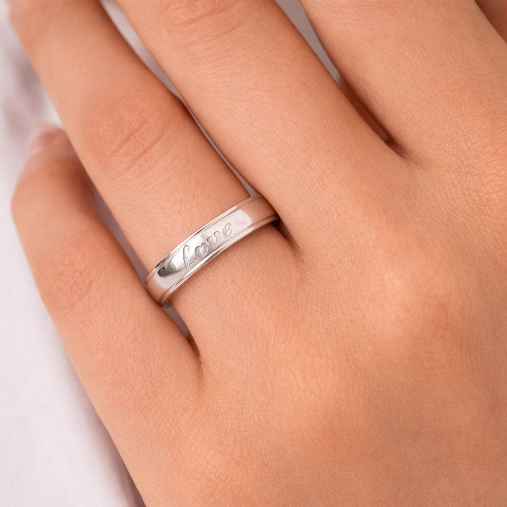 Close-up of rings for women styled in silver tone on hand