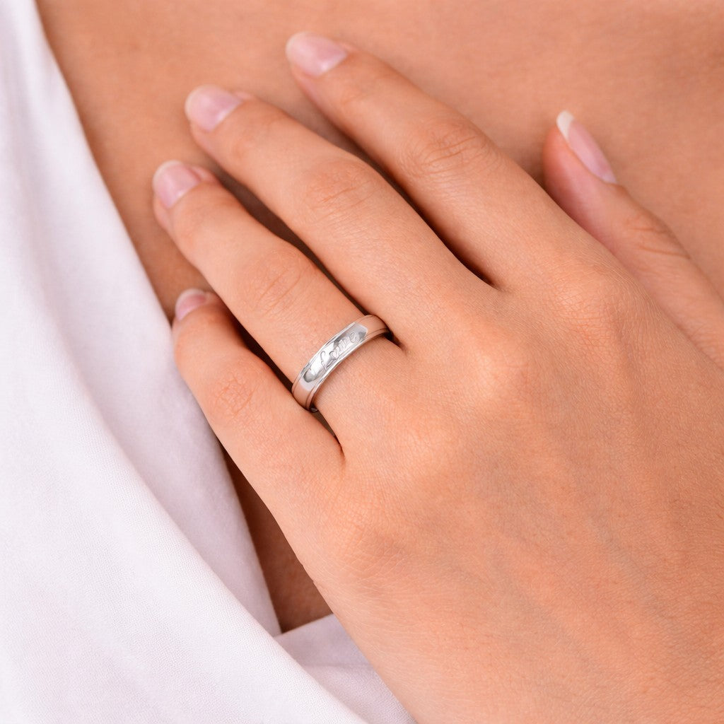Close-up of rings for women styled in silver tone on hand