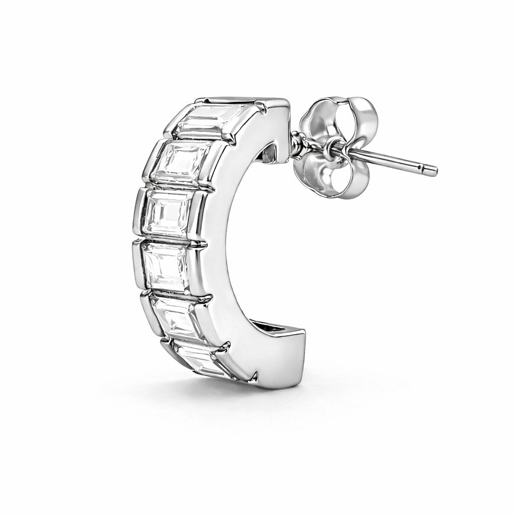 Silver hoop earring with clear gemstones on a white background