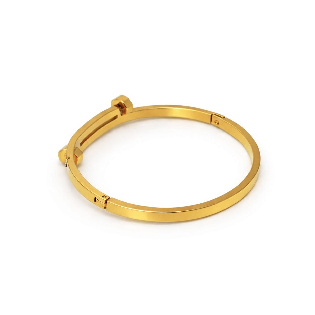 Side angled view of bangles with slim sculptural shape and white stone line