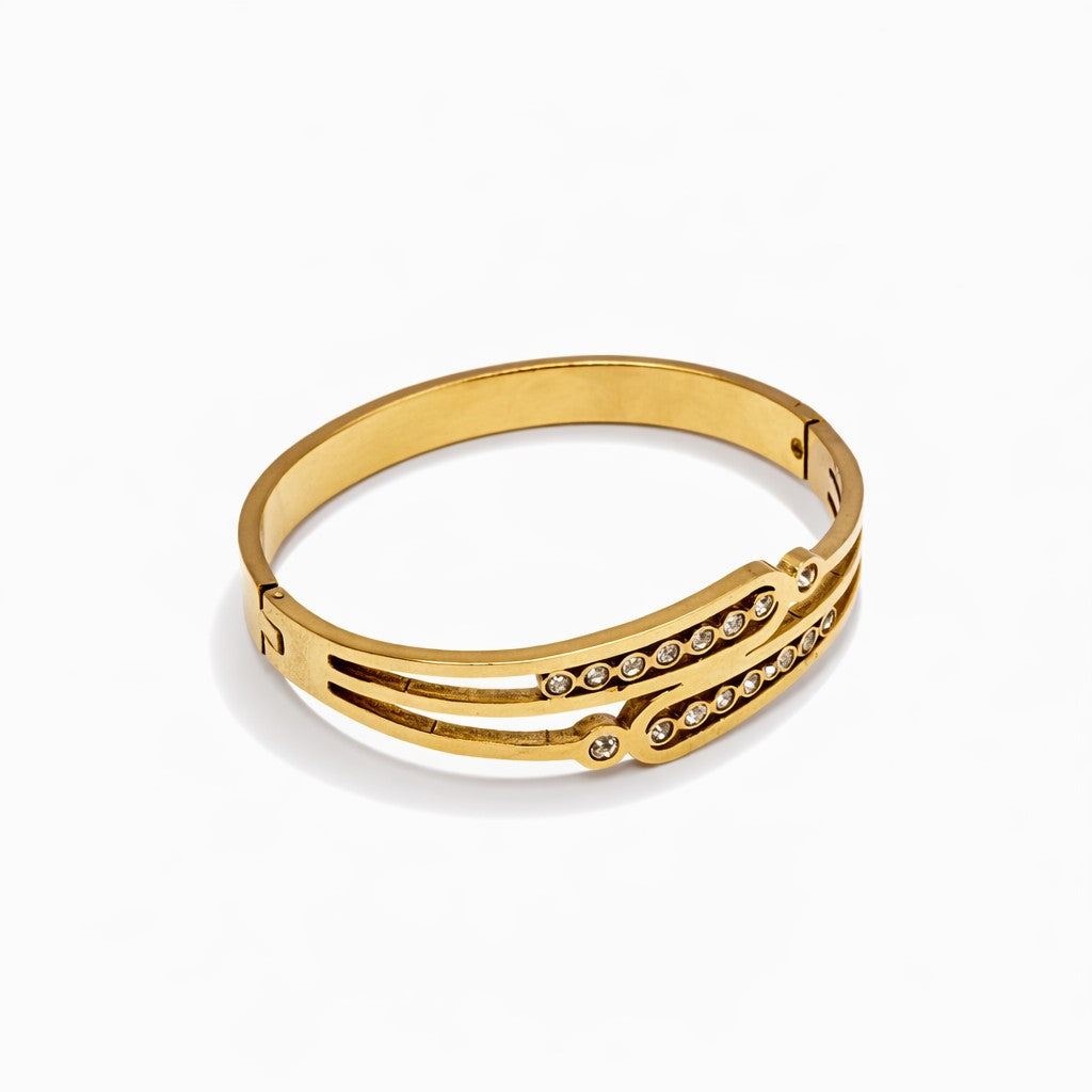 Front angled view of bangles with gold-tone finish and stone accents