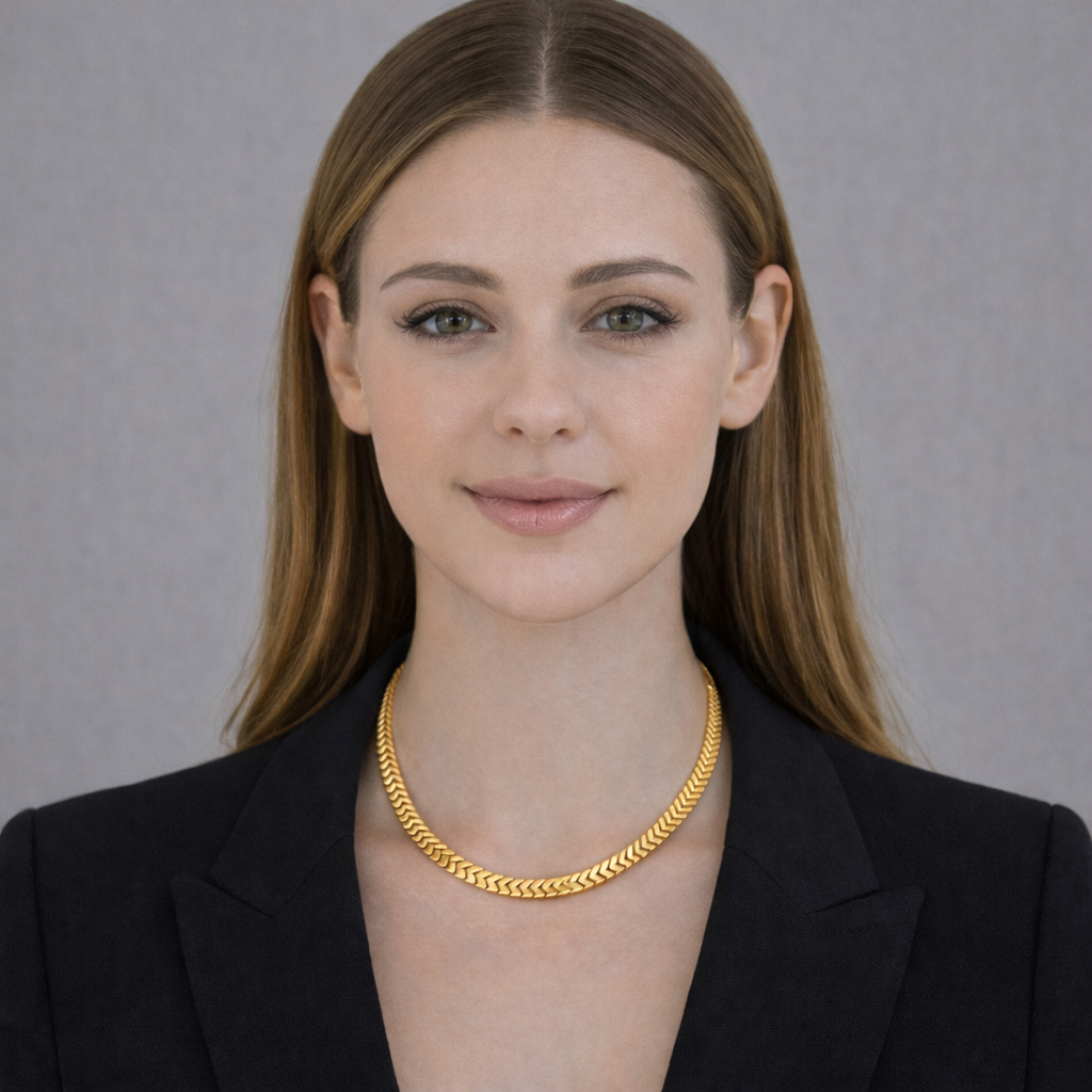 Gold-tone necklaces for women styled on model with a flat chain look