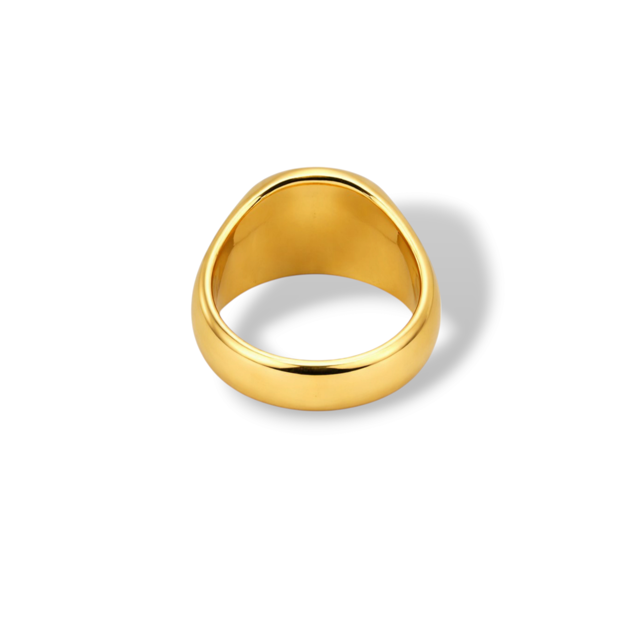 Angled view of stone ring with polished gold-tone signet design