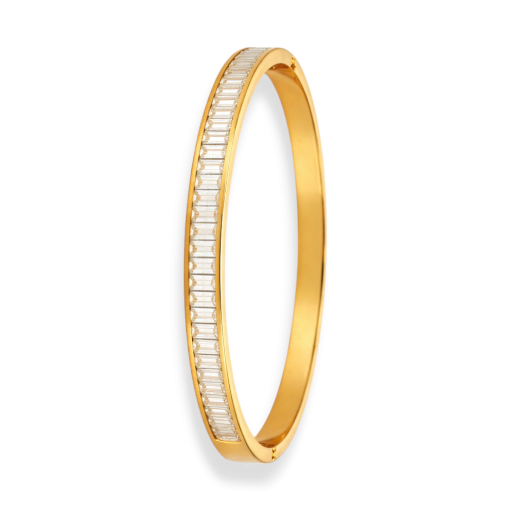 Angled view of bangles for women with polished gold-tone surface and stone-set line