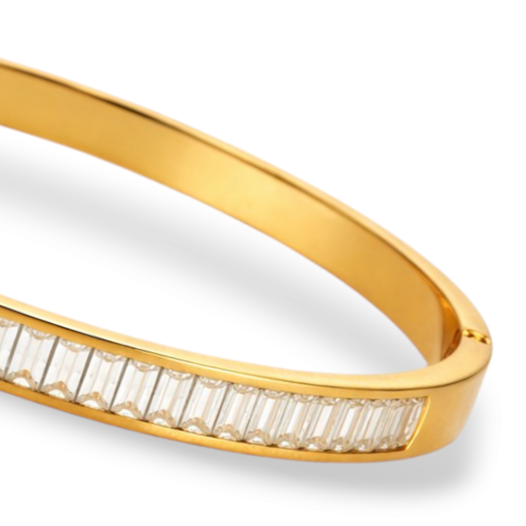 Side view of bangles with slim gold-tone shape and refined stone setting