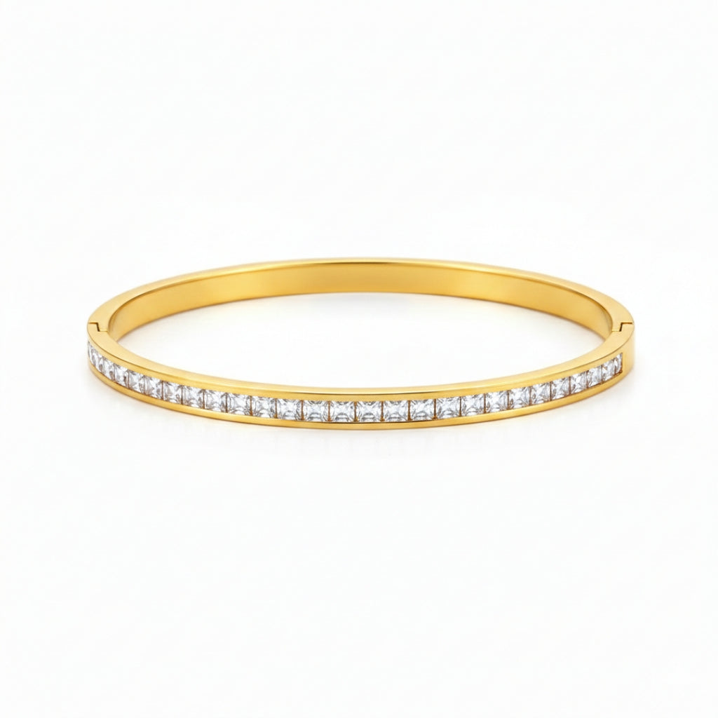 Front view of artificial bangles with slim gold-tone design and white stones