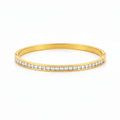 Front view of artificial bangles with slim gold-tone design and white stones