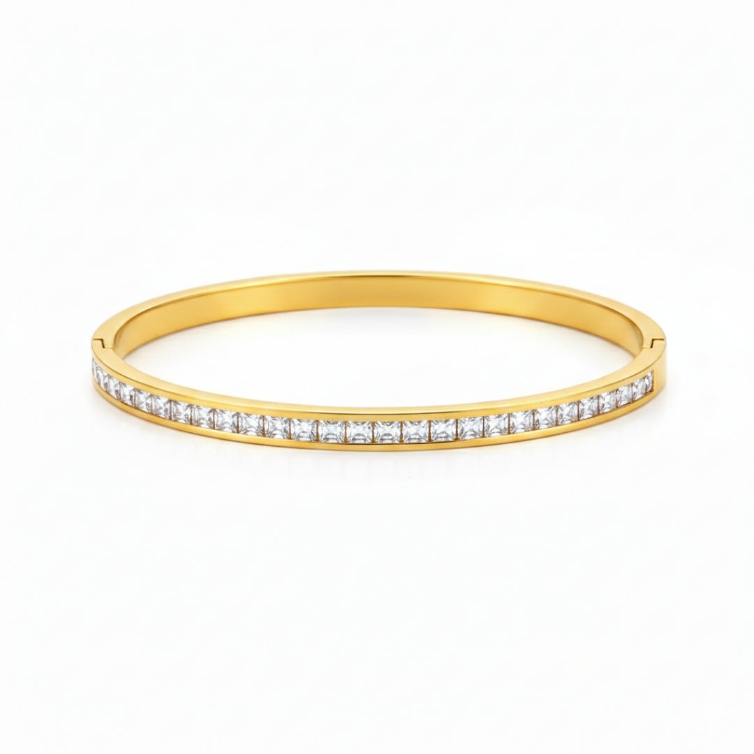 Front view of artificial bangles with slim gold-tone design and white stones