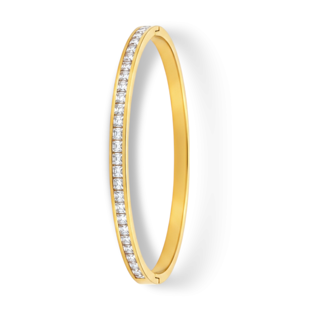 Side view of bangles with slim gold-tone shape and stone-set front