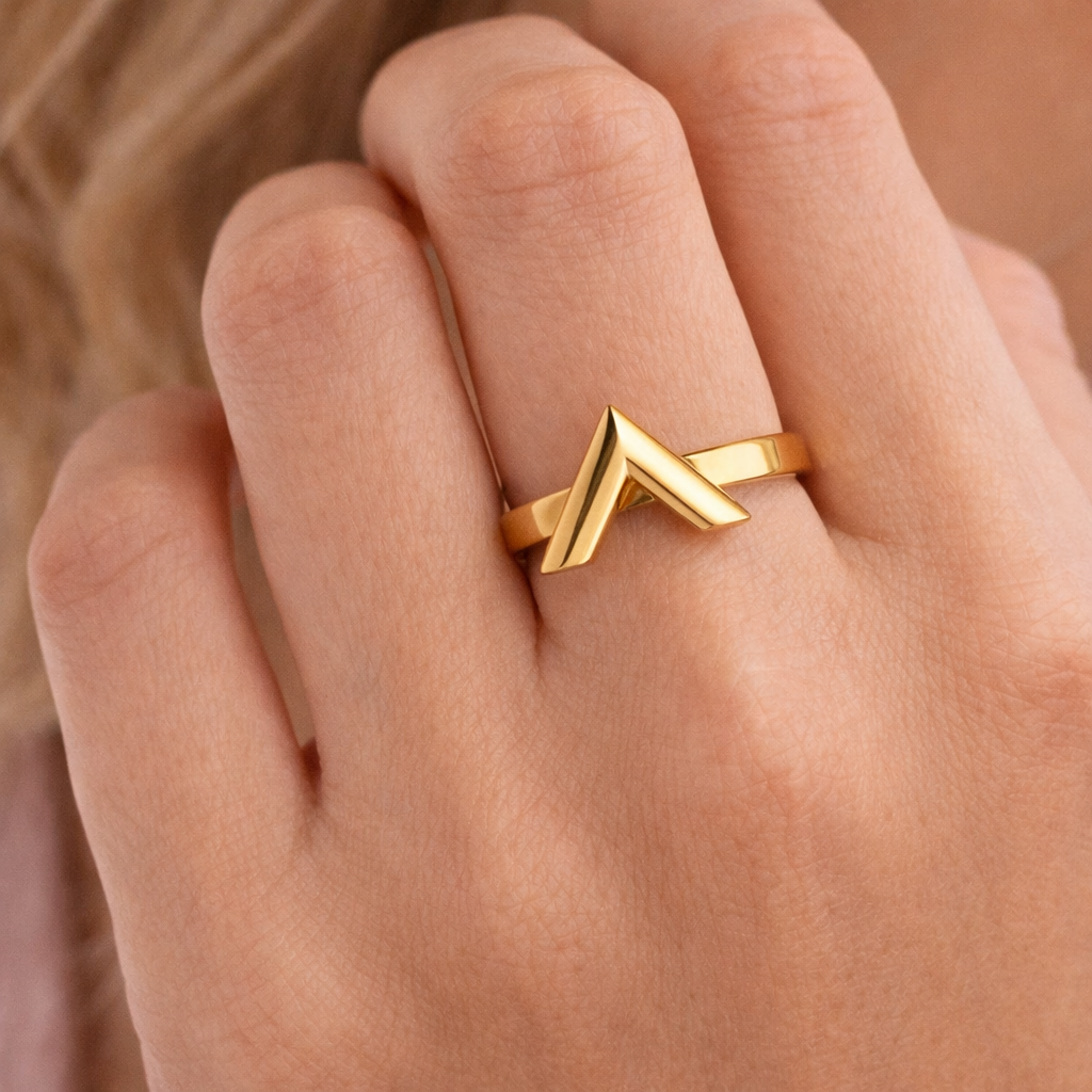 Gold V ring worn on hand minimal style